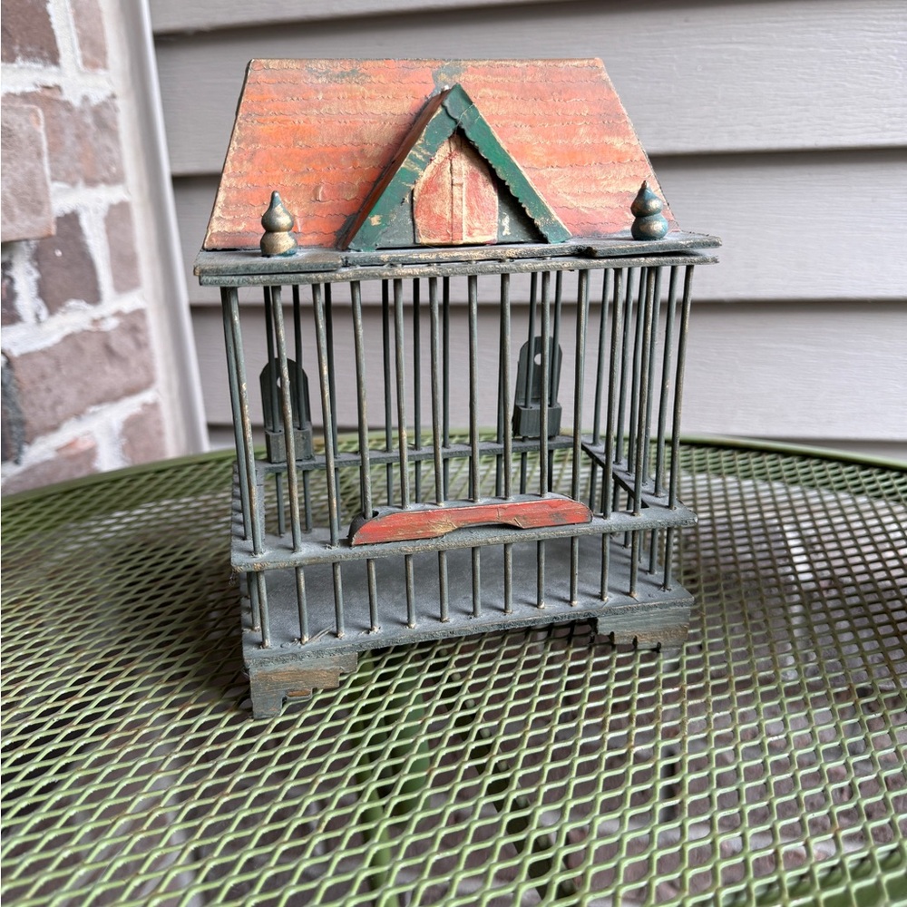 Vintage French-style birdcage in Green and Orange/Gold roof.